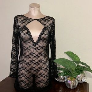 Black lace slip lingerie with lace trim and sexy neckline also sexy back cutout